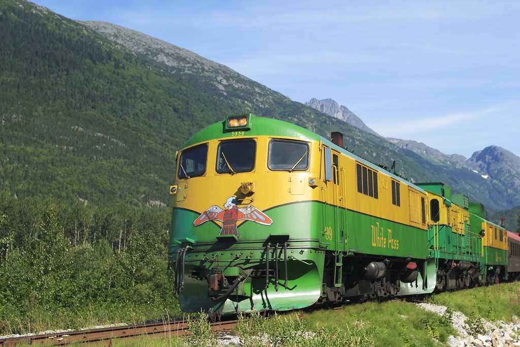A White Pass and Yukon Railroad General Electric diesel-electric locomotive returning to Skagway after it’s round trip to Fraser, YT. Photo by  Alan Vernon/Flickr