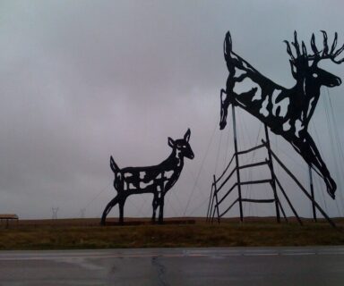 Deer crossing sculpture