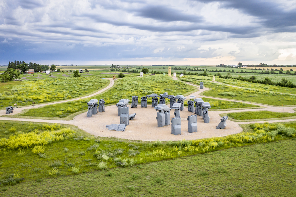 Alliance, NE, USA - July 15., 2019:  Carhenge - famous car sculpture created by Jim Reinders, a modern replica of  England's Stonehenge using old cars, aaerial perspective in summer scenery.