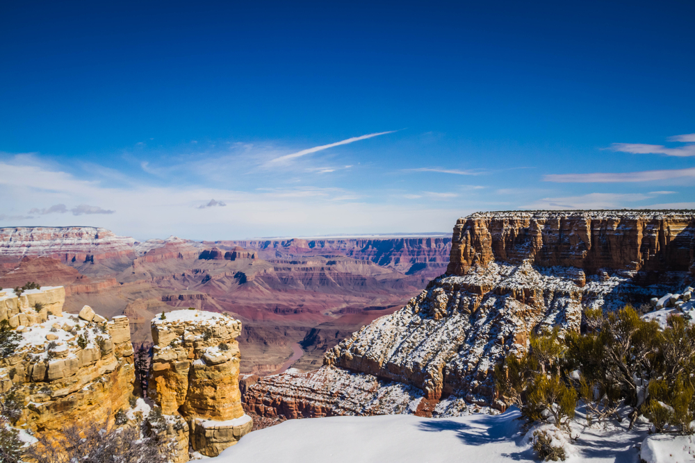 The Grand Canyon in winter with snow in the higher elevations.  This is an epic image taken from the Grand Canyon village in Grand Canyon National Park in Arizona, USA.