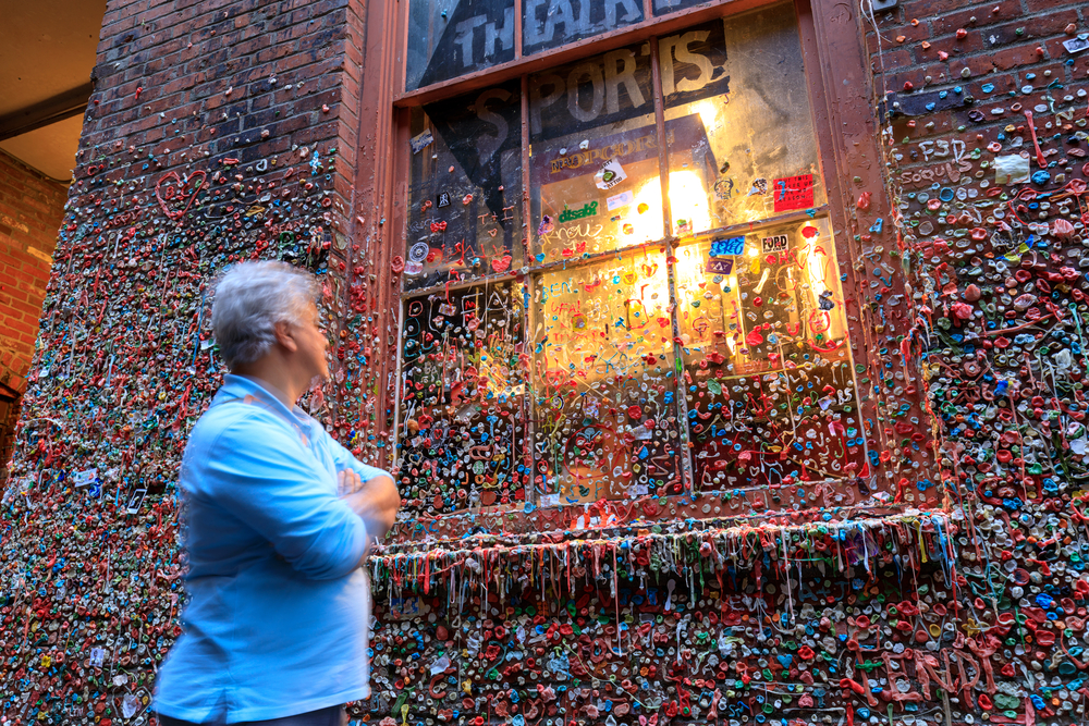 The Market Theater Gum Wall in downtown Seattle. It is a local landmark in downtown Seattle, in Post Alley under Pike Place Market.