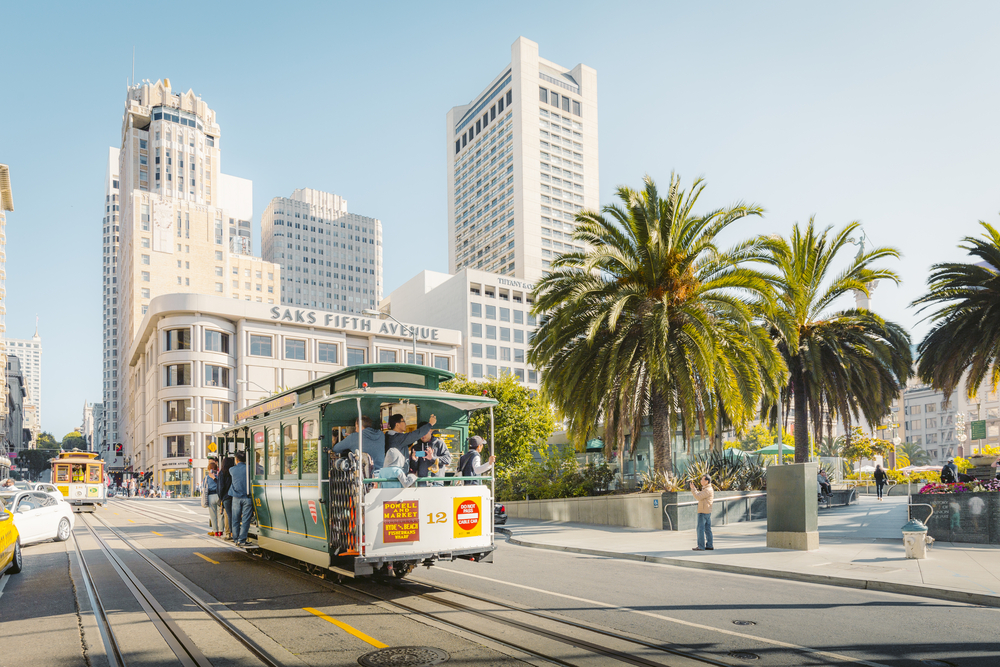 Traditional Powell-Hyde cable cars at Union Square in central San Francisco in beautiful golden morning light, California, USA